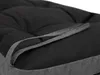 A close-up view of a cushion with a fabric loop. Náhled obrázku produktu