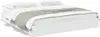 A white bed frame with white and gray bedding. Produktbild-Vorschau