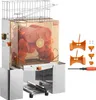 A commercial orange juicer with a transparent cover showing oranges inside, along with various accessories and a screwdriver. Anteprima dell’immagine prodotto