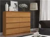 A wooden dresser with eight drawers is shown in a room with patterned wallpaper and a floor lamp. Anteprima dell’immagine prodotto