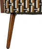 Close-up of the leg and patterned upholstery of a chair or ottoman. Náhled obrázku produktu