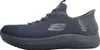A side view of a black Skechers slip-on shoe. Voir les images du produit