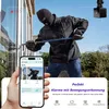 A person is shown attempting to break into a house, with a security camera and a smartphone displaying a live feed of the event. Produktbild-Vorschau
