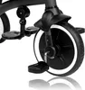 A close-up view of the front wheel and pedals of a black tricycle. Anteprima dell’immagine prodotto