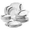 A collection of white ceramic dinnerware with a black and gray abstract design, stacked and arranged. Náhľad obrázku produktu