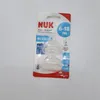 A product package for NUK First Choice+ bottle nipples, showing the product inside the clear plastic packaging. Podgląd zdjęcia produktu
