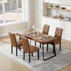 A dining room scene with a wooden table and chairs set up for a meal. Produktbild-Vorschau