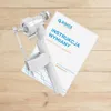 A toilet fill valve and its instruction manual are placed on a wooden surface. Produktbild-Vorschau