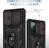 Two black phone cases are shown side-by-side against a light gray and white background. The cases have a rugged design and feature a sliding camera cover and a ring holder. Produktbild-Vorschau