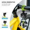 A close-up of a bicycle handlebar with a GoPro camera mounted using a green silicone strap. The image also includes inset graphics demonstrating the product's functionality. Produktbild-Vorschau