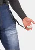A person is holding keys attached to their pants. Produktbild-Vorschau