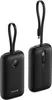 Two black power banks are shown against a white background. One is viewed from the front, showing a circular LED display and the brand logo. The other is viewed from the side, showing integrated cables. Podgląd zdjęcia produktu