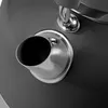 A close-up view of the spout of a gray kettle. Podgląd zdjęcia produktu