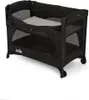 A black Joie travel cot with a grey mattress pad inside. Produktbild-Vorschau
