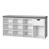 A white shoe cabinet with a gray cushioned top and a single drawer. Produktbild-Vorschau