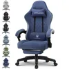 A blue gaming chair with a footrest is shown from the front, with other color options of the same chair displayed on the left. Podgląd zdjęcia produktu