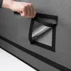 A hand is shown opening a vent flap on a grow tent. Produktbild-Vorschau