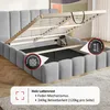 A bed frame with its storage compartment open, showing the slatted base and internal space. There are informational callouts on the image. Produktbild-Vorschau