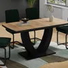 A dining table with chairs in a room setting. Anteprima dell’immagine prodotto