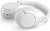 A pair of white Philips headphones is shown on a white background. Voir les images du produit