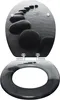 A toilet seat with a decorative image of stepping stones on water. Produktbild-Vorschau
