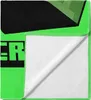 A folded green towel with black text on it. Produktbild-Vorschau