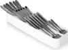 A white organizer filled with silver cutlery. Anteprima dell’immagine prodotto