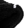 A close-up view of the textured black fabric of a balaclava. Produktbild-Vorschau