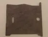 A flat, gray, rectangular metal part with a slot and a hole. Anteprima dell’immagine prodotto