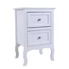 A white two-drawer nightstand with silver knobs, shown against a white background. Anteprima dell’immagine prodotto
