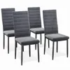 Four dark gray dining chairs are arranged on a white background. Voir les images du produit
