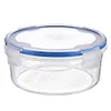 A clear studio shot of a round, clear plastic food storage container with a blue lid and white clasps. Náhled obrázku produktu