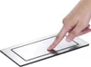A hand is pressing on a stainless steel electrical outlet. Anteprima dell’immagine prodotto