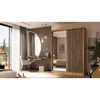 A bedroom scene featuring a sliding door wardrobe with a mirrored front, a dressing table with a round mirror, and a chair. Produktbild-Vorschau