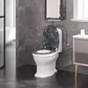 A modern bathroom with a toilet featuring a marble-patterned seat. Produktbild-Vorschau
