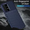 A dark blue phone case with a ribbed texture is shown diagonally against a dark, textured background with bokeh lighting effects. Produktbild-Vorschau