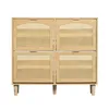 A product shot of a wooden shoe cabinet with rattan detailing. Produktbild-Vorschau