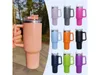 A collage of insulated tumblers with handles and straws, with one tumbler being held by a hand in the foreground. Náhled obrázku produktu