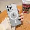 A clear phone case with MagSafe and Apple logo is held up, with a coffee cup in the background. Produktbild-Vorschau