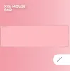 A pink XXL mousepad is shown on a pink gradient background with text indicating 'XXL MOUSE PAD'. Produktbild-Vorschau