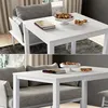 A dining table with a sofa and decorative items. Náhled obrázku produktu