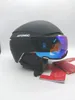 A black Atomic ski helmet with a visor is displayed on a white background. Náhled obrázku produktu