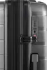 A close-up view of a gray suitcase, focusing on the combination lock and zipper. Produktbild-Vorschau