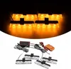 A product shot of multiple orange LED strobe lights and their accessories, including a remote control and a control box. Náhľad obrázku produktu