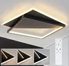 A modern square LED ceiling light with a remote control. Náhľad obrázku produktu