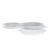 A set of white plates and a bowl on a white background. Voir les images du produit