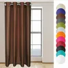 A brown curtain hangs in front of a window, with a row of colored swatches to the right. Podgląd zdjęcia produktu