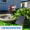 A solar fountain pump is shown in a garden birdbath with flowers and plants. Podgląd zdjęcia produktu