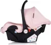 A pink and black baby car seat is shown against a white background. Anteprima dell’immagine prodotto