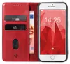 A red flip cover phone case is open, revealing card slots and a banknote. A smartphone is placed inside the case, displaying its lock screen. Produktbild-Vorschau